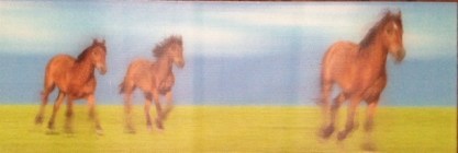 When you tilt it back and forth, the horses gallop in place.  Kinda cool actually.